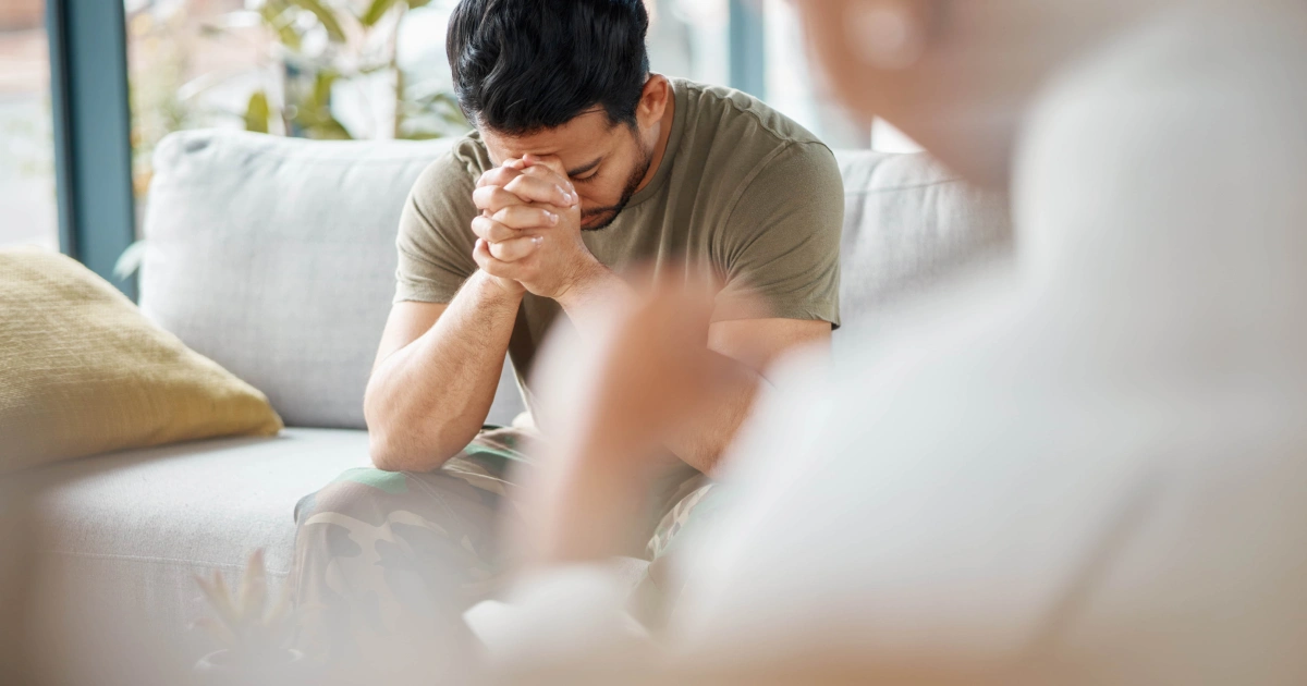A distressed man in therapy for Psychiatric Services in Charlottesville, VA.