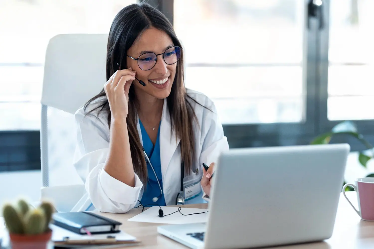 Healthcare provider conducting a telemedicine appointment for ongoing medical care via video consultation